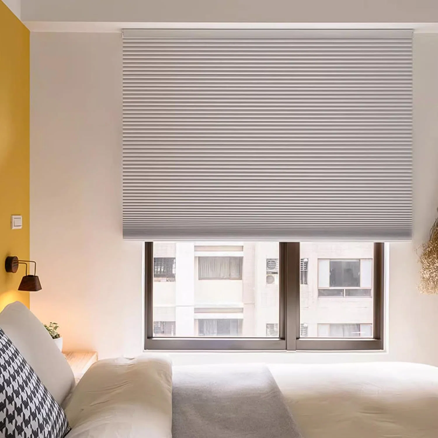 Cordless honeycomb shade components in bedroom application Cordless honeycomb shade components in bedroom application
